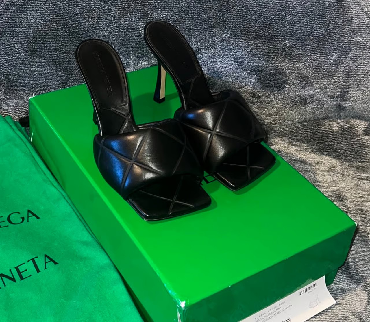 Black Calf leather open toe silver tone logo plaque slip on style